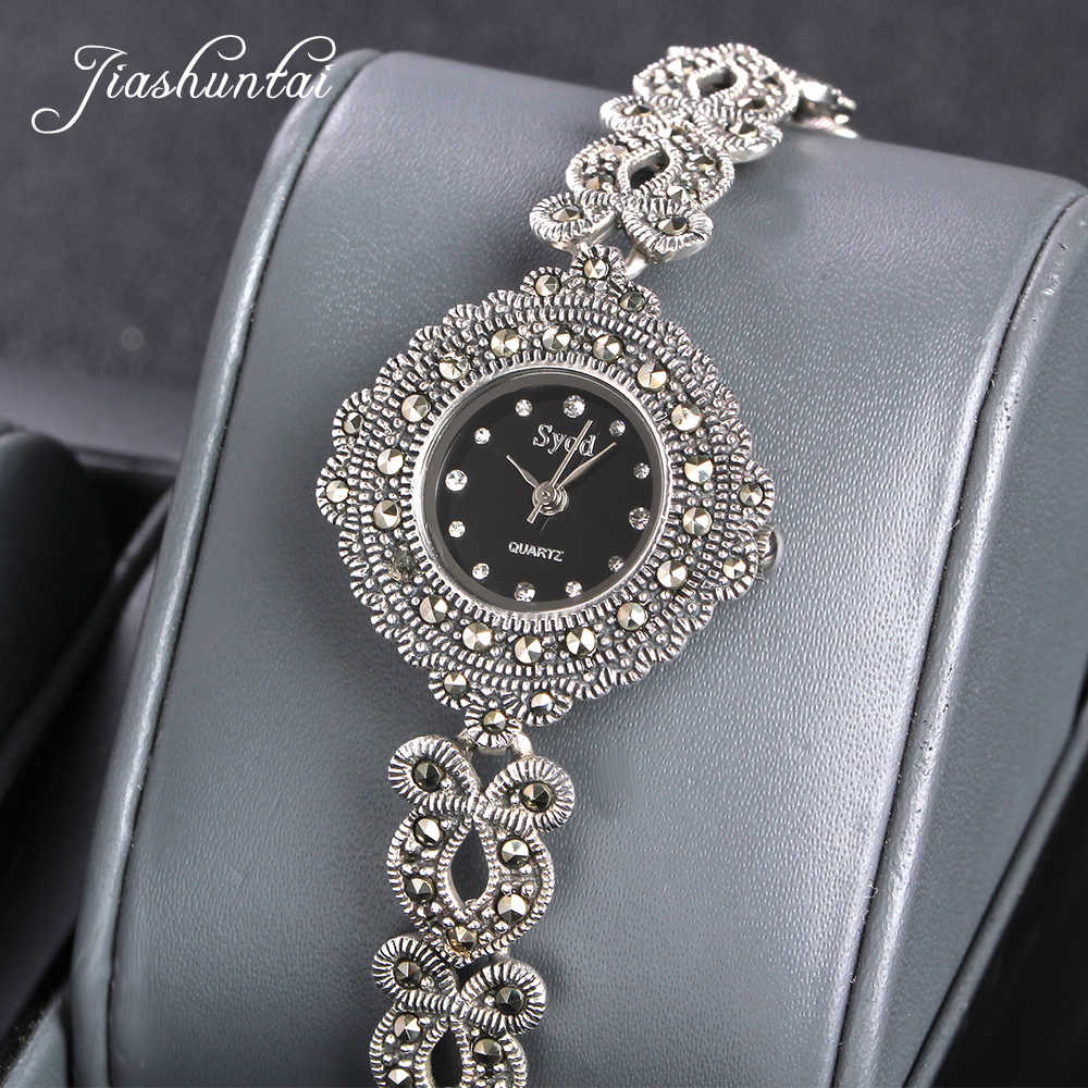 серебряные часы на ювелирном браслете